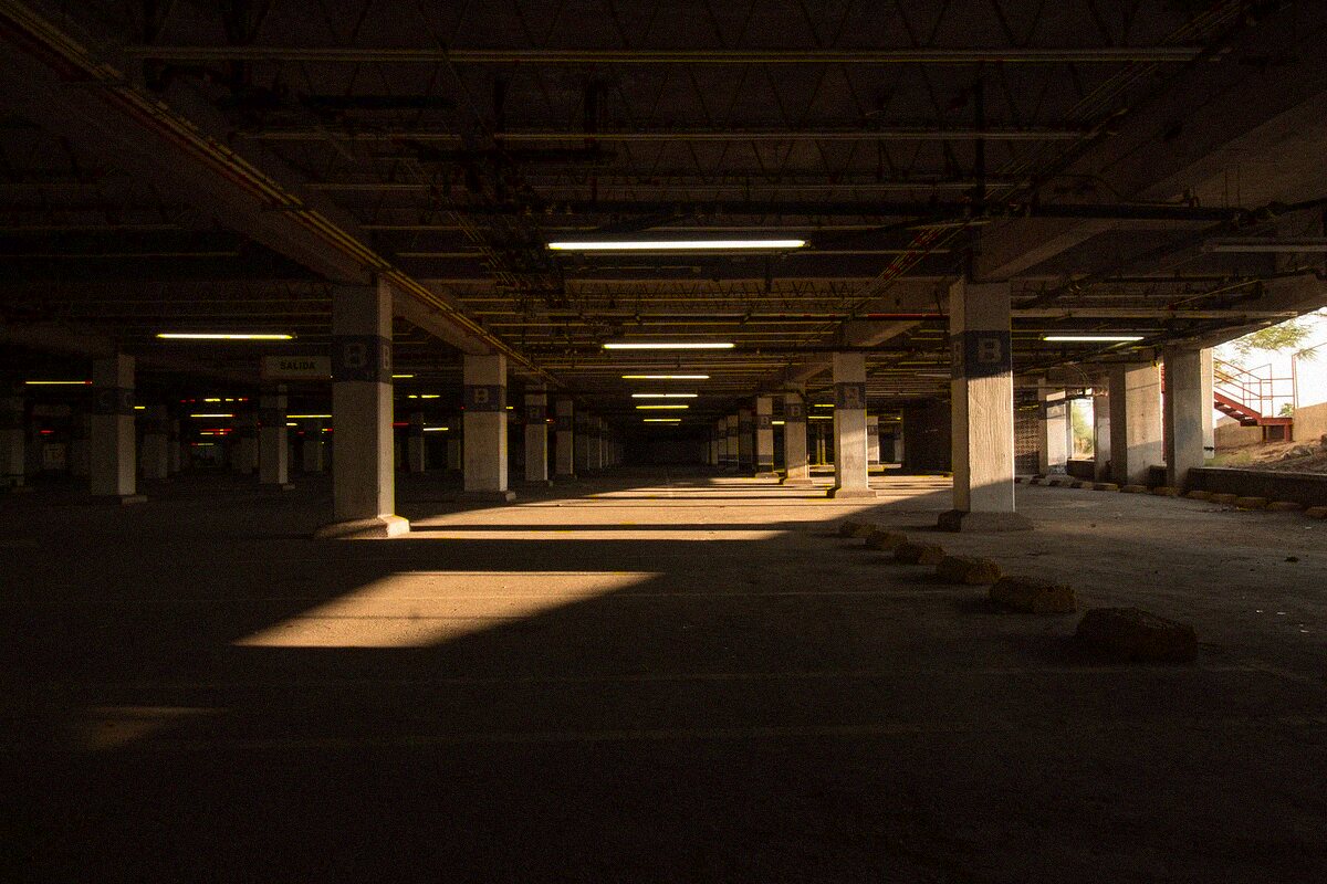 Security officer patrolling a parking garage deck in Orlando